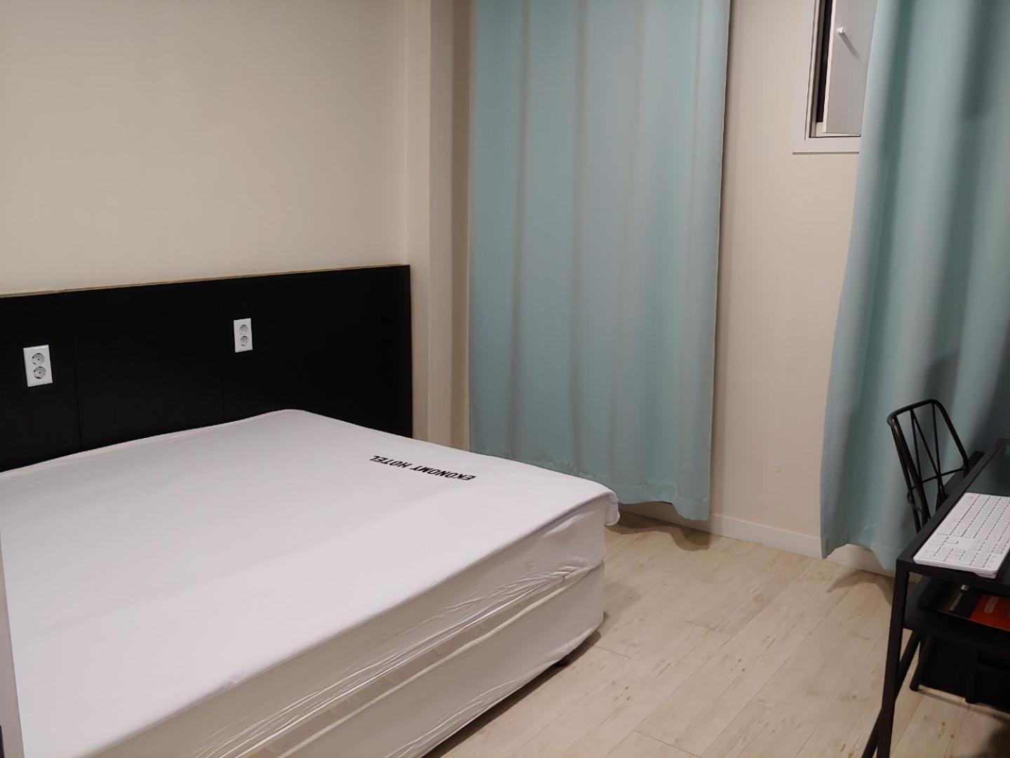 Ekonomy Hotel كومي المظهر الخارجي الصورة